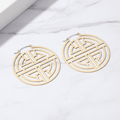 Oversized Gold Geometric Circle Hoop Earrings - flat lay on marble